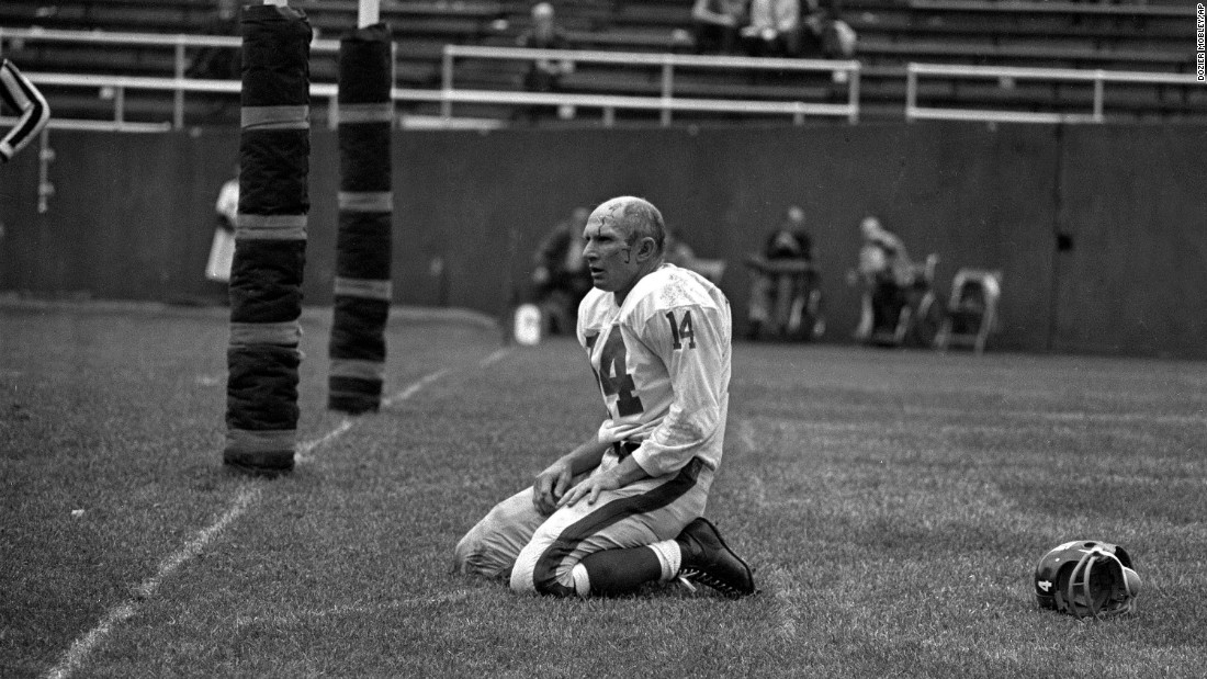 Hall of Fame football quarterback &lt;a href=&quot;http://bleacherreport.com/articles/2737727-pro-football-hall-of-fame-qb-ya-tittle-dies-at-age-90&quot; target=&quot;_blank&quot;&gt;Y.A. Tittle &lt;/a&gt;died October 8 at the age of 90. Tittle made the Pro Bowl seven times over his 17-year career, and he was the NFL&#39;s MVP in 1963. In this photo, Tittle squats on the field after being hit hard during a game against the Pittsburgh Steelers in 1964. This became an iconic photograph that helped cement Tittle&#39;s name in football history.