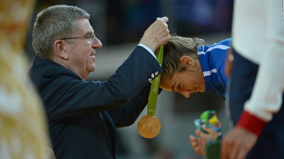 &quot;The second shot I am proud of as it&#39;s IOC president Thomas Bach awarding Kelmendi her medal. Once again it&#39;s historic, but I also took a risk and snuck around to the side to see both of their faces and managed to find a gap between two of the medal hostesses to get the exact shot I wanted. This also meant I&#39;m sure I&#39;m the only person in the world with this image!&quot;