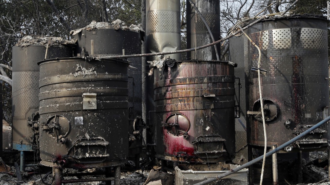 Damaged winemaking vats and tanks stand in ashes and debris at the Paradise Ridge Winery in Santa Rosa.