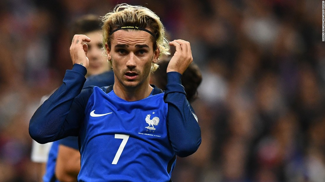 Antoine Griezmann scored one goal and set up another for Olivier Giroud as the 1998 champions topped European Group A.