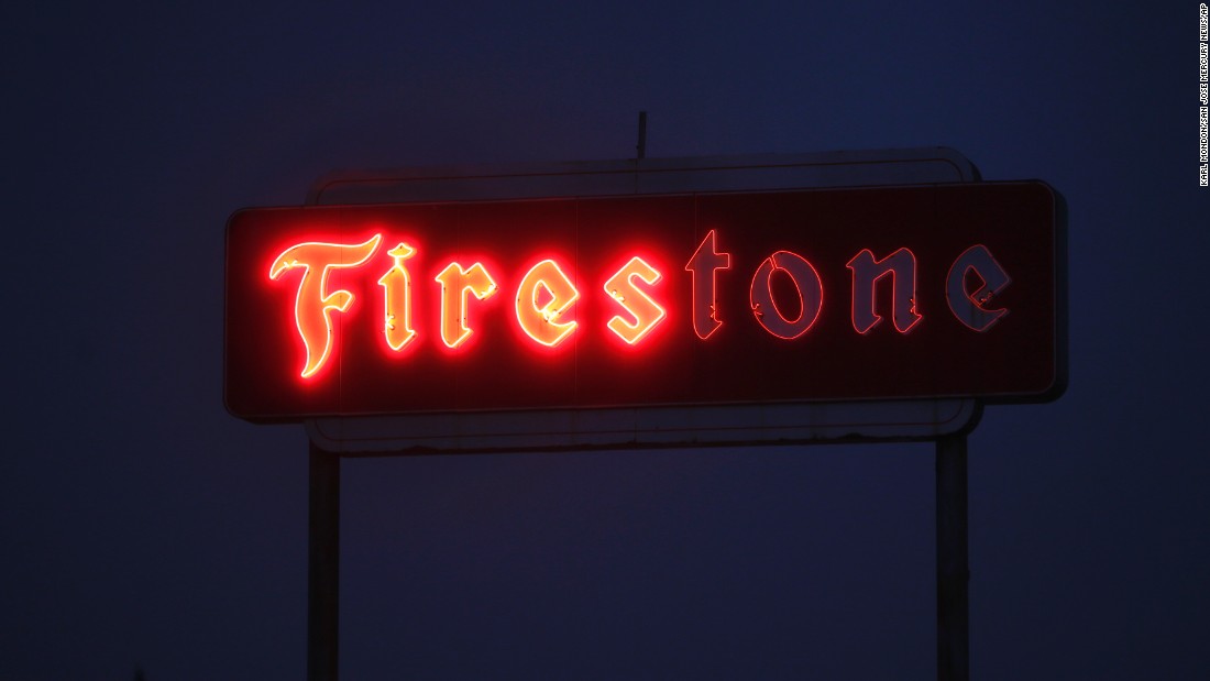 The sign of a Firestone store malfunctions in Santa Rosa on Tuesday, October 10.