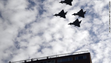Spanish Eurofighter planes fly during the Spanish National Day military parade in Madrid on Thursday.
