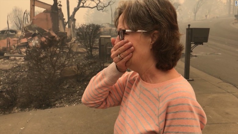 Homeowners cry as they return after fire