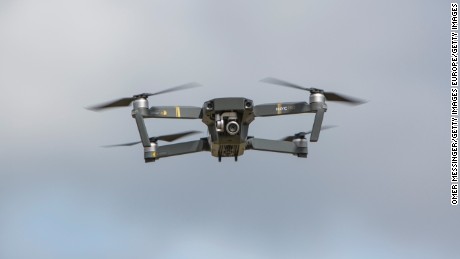 BERLIN, GERMANY - SEPTEMBER 03: A DJI Mavic Pro Quadcopter drone is seen on flight at the Dronemasters 2017 convention on September 3, 2017 in Berlin, Germany. The annual event, now in its second year, brings together drone racers, developers, users and manufacturers for a day of events, exhibitions and presentations.  (Photo by Omer Messinger/Getty Images)