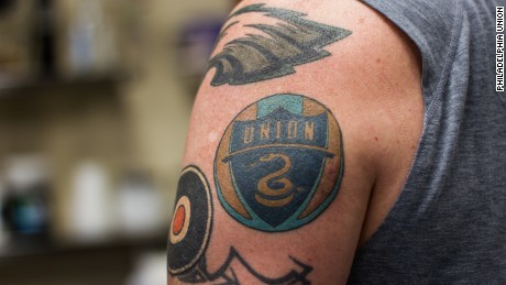 The Union's logo with a coiled snake is one of the most popular tattoos among fans.