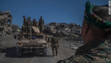 Soldiers of SDF on the top of a humvee during celebration of the liberation of Raqqah.
West Raqqah October 17, 2017