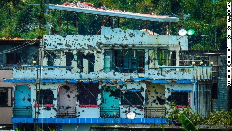 Bullet-riddled houses are seen in Marawi on August 28, 2017.