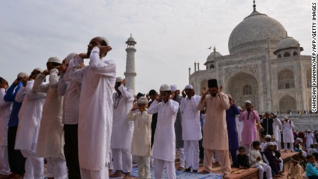 Muslims pray during the Eid al-Adha festival at the mosque inside the Taj Mahal in Agra on September 13, 2016. 
