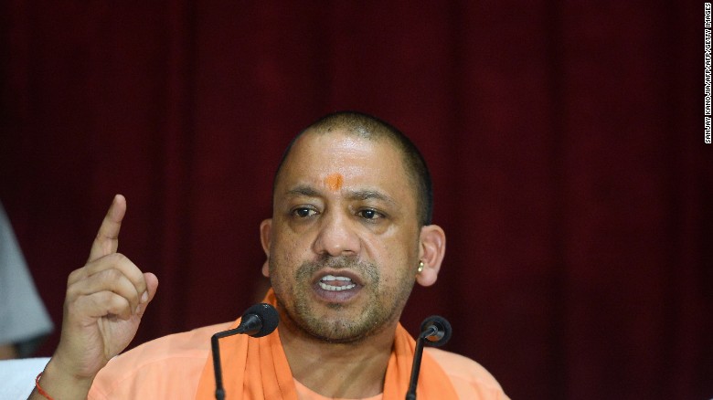 Uttar Pradesh Chief Minister Yogi Adityanath gestures during a press conference, August 13, 2017.
