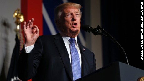 Trump issues warning, but continues to honor Iran deal