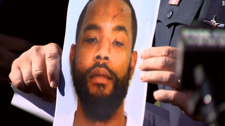 A picture of Radee Labeeb Prince -- who police said is believed to have shot five people Wednesday -- is shown to reporters at a news conference.