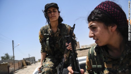 Female Kurdish fighters on the outskirts of Raqqa in July.