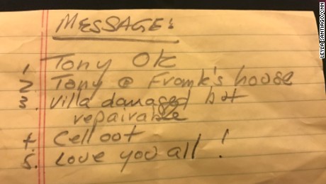 One of the many notes handed to CNN asking to relay information to families.