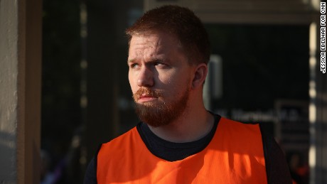 Emory Williamson volunteers as a patient escort outside the EMW Women&#39;s Surgical Center.