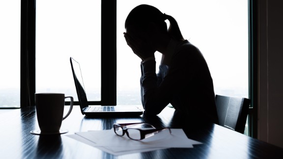 Depressed businesswoman; Shutterstock ID 235784764; Job: -