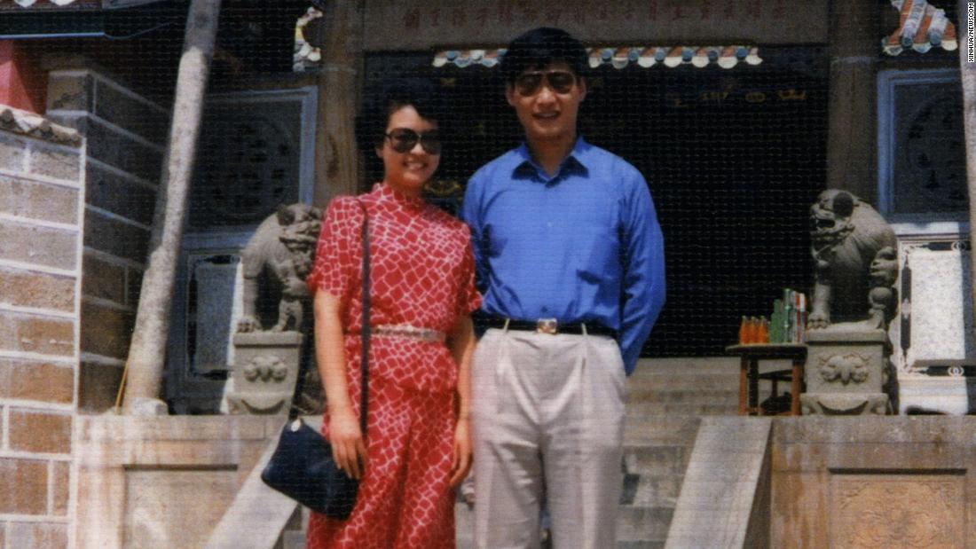 Xi and his new wife, folk singer Peng Liyuan, pose for a photo on China&#39;s Dongshan Island in 1987.
