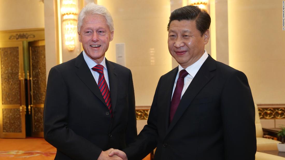 Xi meets with former US President Bill Clinton in Beijing in 2013.