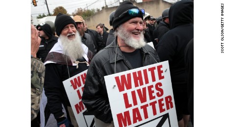 SHELBYVILLE, TN - OCTOBER 28: People hold signs during a &quot;White Lives Matter&quot; rally on October 28, 2017 in Shelbyville, Tennessee. Tennessee Gov. Bill Haslam said state and local law enforcement officials would be out &quot;in full force&quot; for the two white nationalist rallies. The event billed as a White Live Matter rally is hosted by Nationalist Front, which is a coalition of several white supremacist organizations.(Photo by Scott Olson/Getty Images)