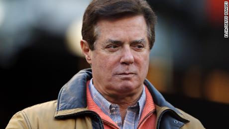 Manafort appears in court in wheelchair, to be sentenced in February