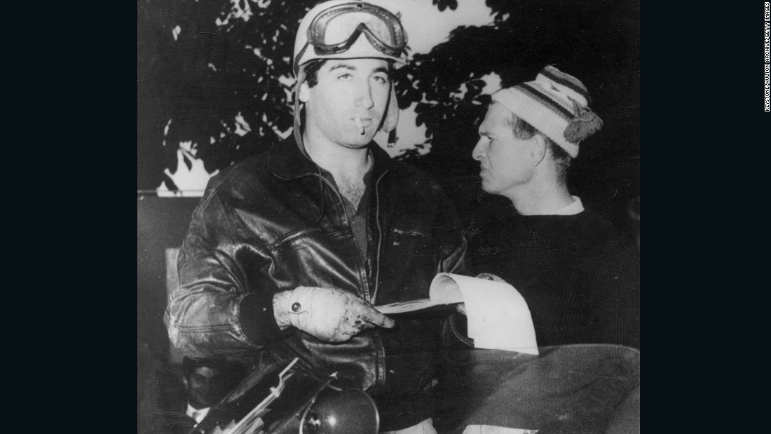 Alfonso de Portago (left), a Spanish aristocrat turned racing driver, with Collins before the start of Italy&#39;s Mille Miglia. Portago was killed when he crashed towards the end of the 1,00-mile road race. The tragedy also took the life of his co-driver and 10 spectators, which included five children. The accident led to banning of the race.