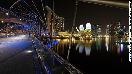 A general view of the Helix Bridge, Marina Bay Sands, ArtScience Museum and the central business district skyline on March 28, 2012 in Singapore.
