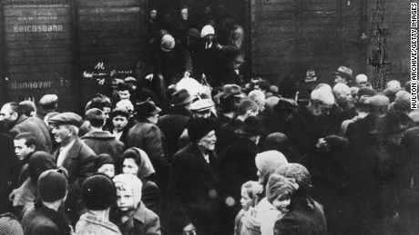 May 1944:  Jews exit a German boxcar at Auschwitz concentration camp in Poland. 