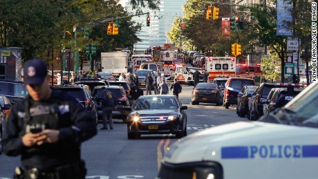 NEW YORK, NY - OCTOBER 31: NYPD officers respond after reports of multiple people hit by a truck after it plowed through a bike path in lower Manhattan on October 31, 2017 in New York City. According to reports up to six people may have been killed. (Photo by Kena Betancur/Getty Images)