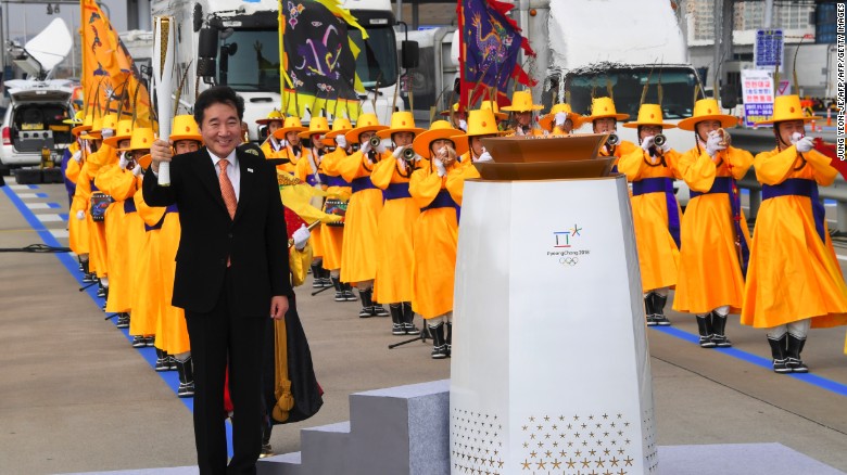 The Prime Minister of the Republic of Korea, Lee Nak-yon, then lit the cauldron to signal the start of the Olympic flame&#39;s journey to PyeongChang 2018.