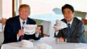 Shinzo Abe surprises Trump with custom hats