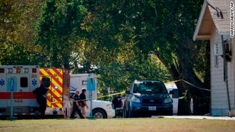 First responders work at the rear of the First Baptist Church of Sutherland Springs in response to a fatal shooting, Sunday, Nov. 5, 2017, in Sutherland Springs, Texas. (AP Photo/Darren Abate)