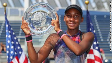 Gauff poses with the US Open&#39;s junior girls&#39; runners-up trophy 