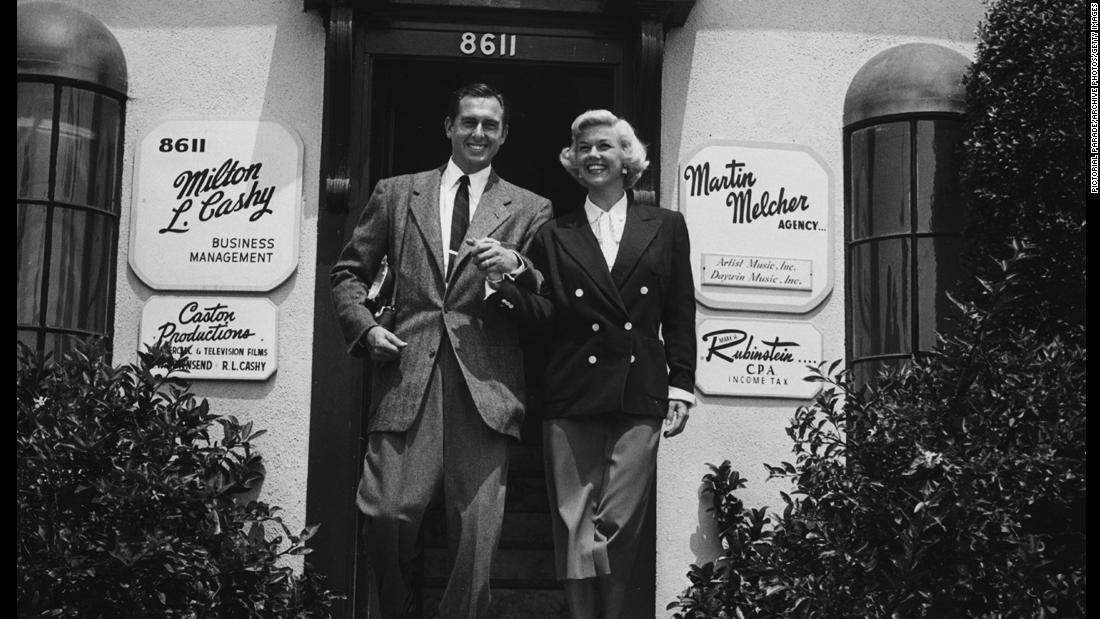 Day with her third husband and manager, Martin Melcher, outside his talent agency in Hollywood. Melcher died unexpectedly in 1968, leaving Day in financial straits.