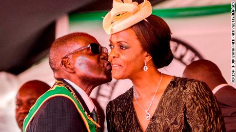 President Robert Mugabe kisses his wife and first lady Grace Mugabe during during the country&#39;s 37th Independence Day celebrations at the National Sports Stadium in Harare April 18, 2017. 