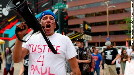 Protesters denounce the police-involved shooting of Native American Paul Castaway in Denver in 2015.