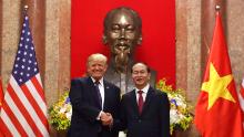 President Donald Trump, left, and Vietnamese President Tran Dai Quang shakes hands at the Presidential Palace, Sunday, Nov. 12, 2017, in Hanoi, Vietnam. Trump is on a five country trip through Asia traveling to Japan, South Korea, China, Vietnam and the Philippines. (AP Photo/Andrew Harnik)