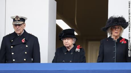 Prince Philip, Queen Elizabeth and Camilla, Duchess of Cornwall, observe the annual Remembrance Sunday memorial.