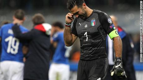 Buffon cries after Italy is eliminated.