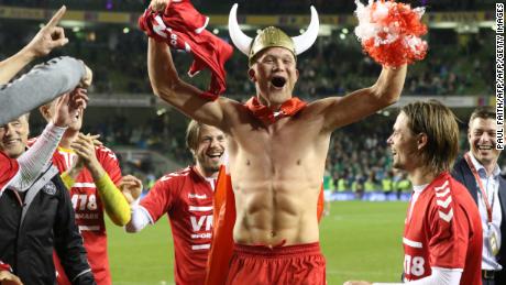 Danish striker Andreas Cornelius celebrates with teammates.