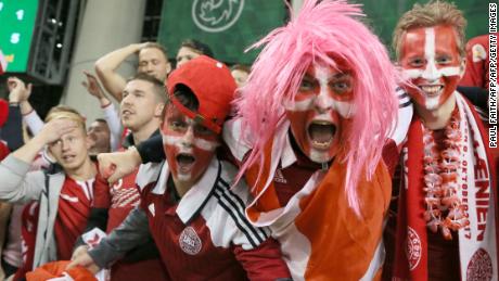 Denmark fans celebrate after their team secure a place at next year&#39;s World Cup in Russia.
