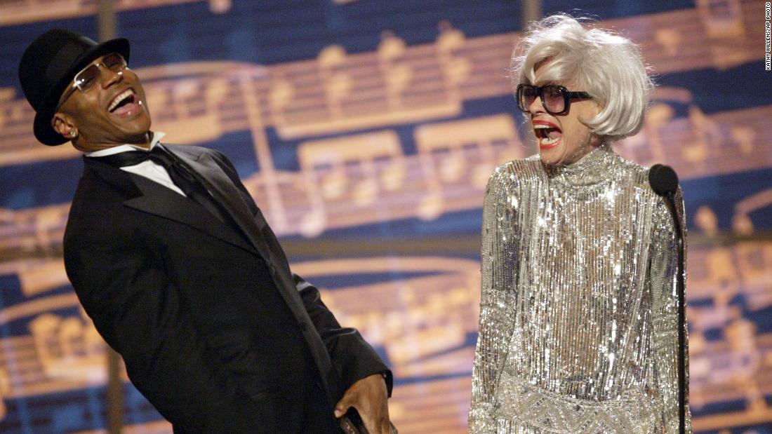 LL Cool J and Channing share a moment before presenting the Tony for best original score to &quot;Avenue Q&quot; in June 2004.