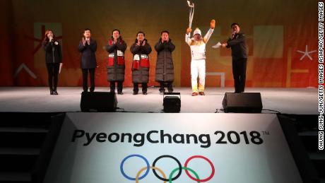 BUSAN, SOUTH KOREA - NOVEMBER 04:  Torch bearer Yang Jung-Mo holds the PyeongChang 2018 Winter Olympics torch during the PyeongChang 2018 Winter Olympic Games torch relay on November 4, 2017 in Busan, South Korea.  (Photo by Chung Sung-Jun/Getty Images)