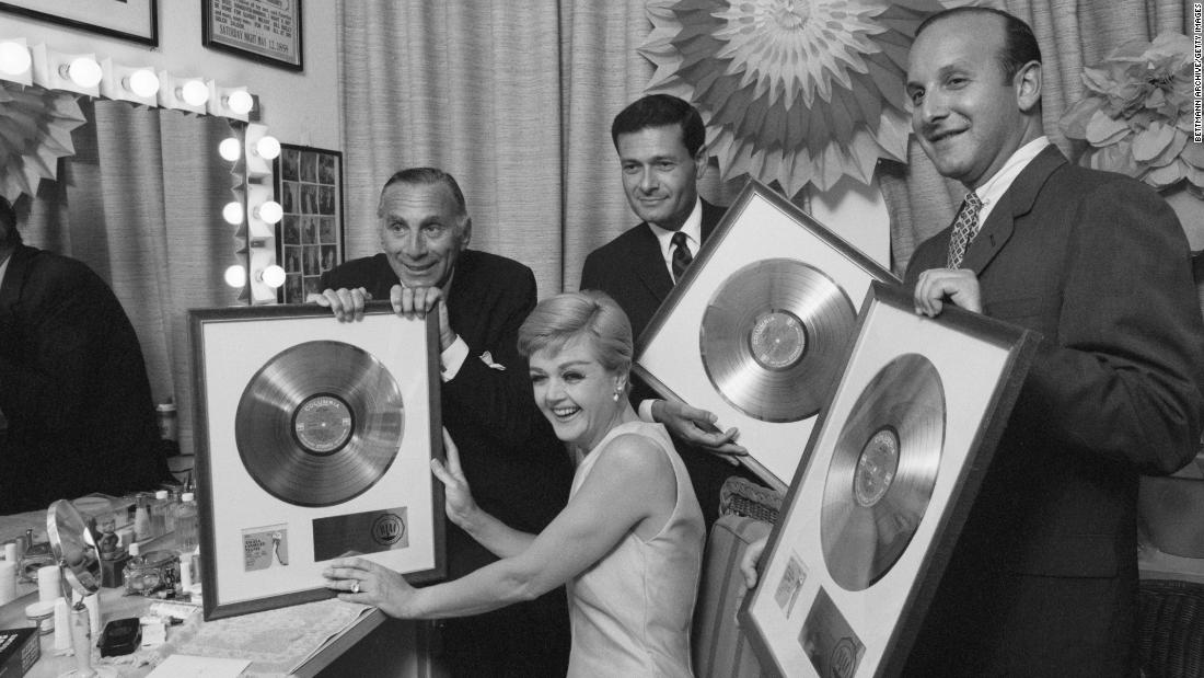 Lansbury poses with gold records in New York in 1967. The records recognized the album from the Broadway musical &quot;Mame,&quot; which Lansbury starred in. For her work in &quot;Mame,&quot; Lansbury also won the Tony Award for best actress in a musical.