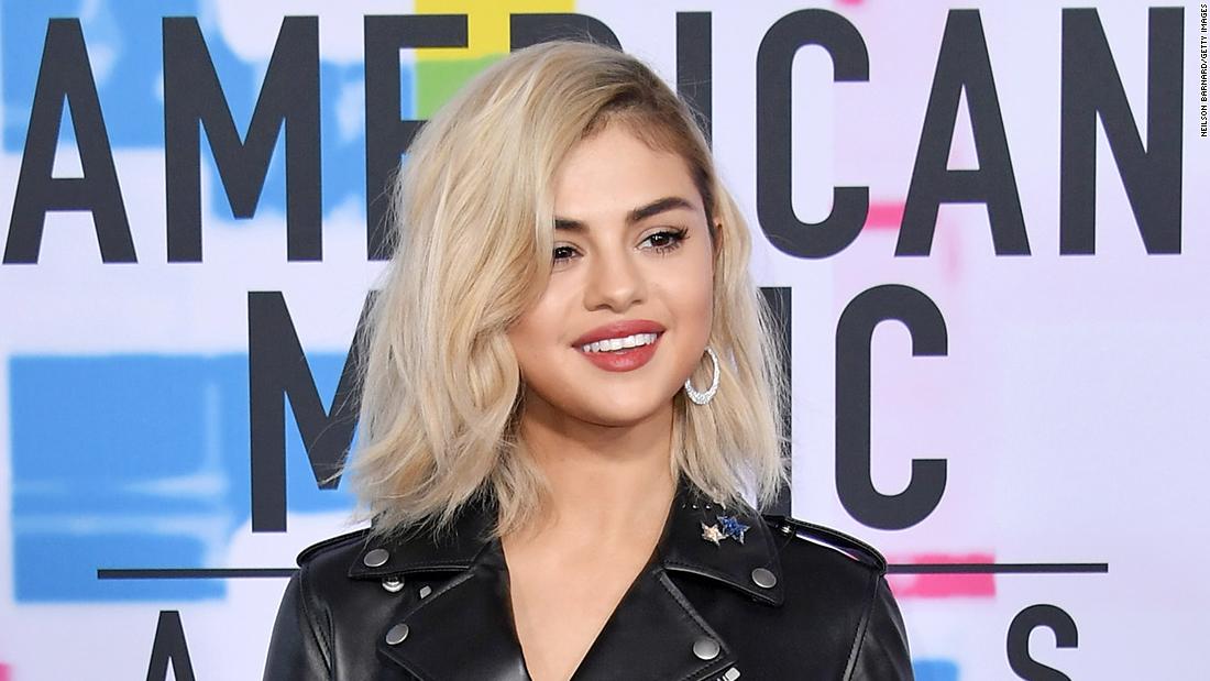Red carpet looks from the American Music Awards