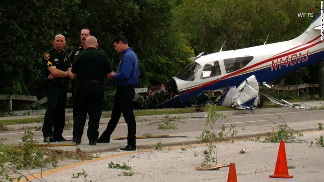 Watch plane buzz cop car in crash CNN Video