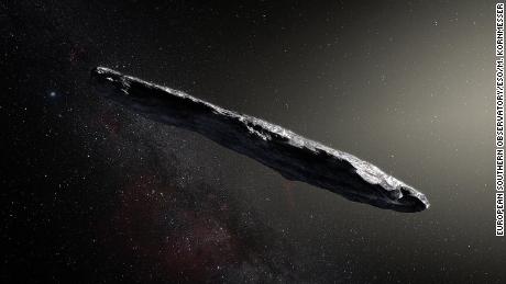 A photo illustration shows the first interstellar asteroid: `Oumuamua. This unique object was discovered on 19 October 2017 by the Pan-STARRS 1 telescope in Hawai`i. Subsequent observations from ESO&#39;s Very Large Telescope in Chile and other observatories around the world show that it was travelling through space for millions of years before its chance encounter with our star system. `Oumuamua seems to be a dark red highly-elongated metallic or rocky object, about 400 metres long, and is unlike anything normally found in the Solar System.