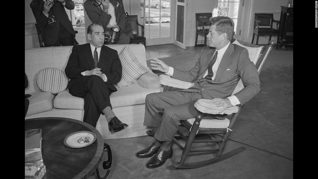 John F. Kennedy, our nation&#39;s youngest president, had a host of medical conditions that plagued him since childhood. Here, Kennedy entertains Alberto Franco Nogueira, the foreign minister of Portugal, while sitting in the rocking chair his doctor ordered to support his excruciatingly painful lower back. The photo was taken November 7, 1963, just two weeks before he was assassinated.