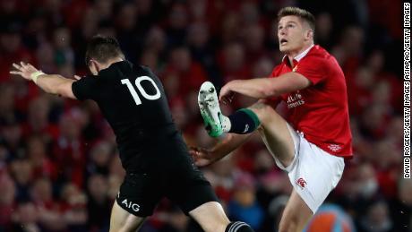 Owen Farrell (right) is put under pressure by New Zealand&#39;s Beauden Barrett during the third and final test of this year&#39;s Lions Tour.