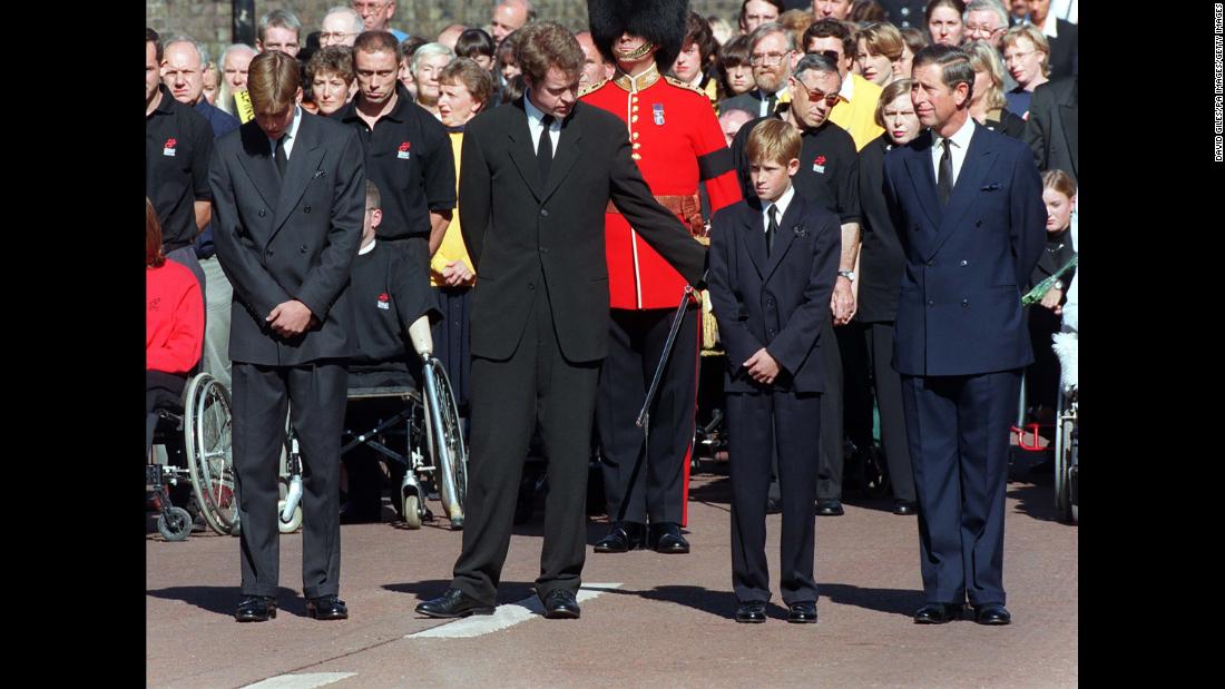 Princess Diana&#39;s brother, Earl Spencer, offers Harry a reassuring arm during her funeral service in 1997.