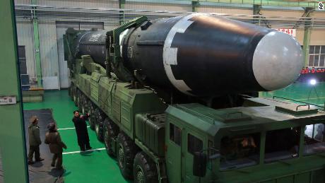 North Korean leader Kim Jong Un inspects the Hwasong-15 before its launch Wedneday. 