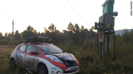 Chris and Julie Ramsey charge up their Nissan Leaf on the Mongol Rally.